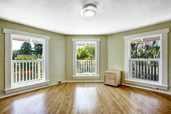 Room with tree windows in empty house — Stock Photo, Image