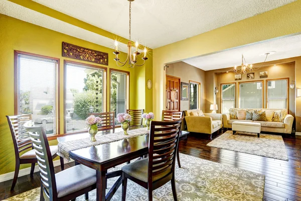 Bright yellow dining room — Stock fotografie