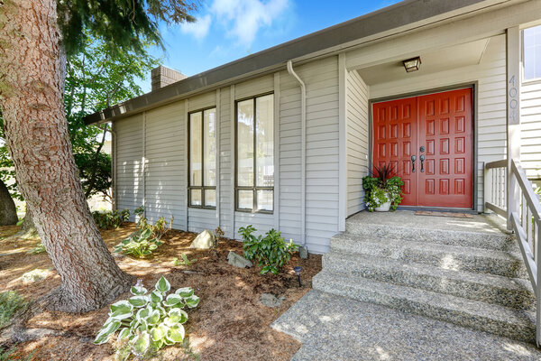 Entrance porch with red door