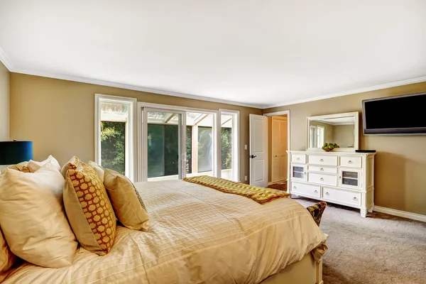 Beautiful bedroom with vanity cabinet and tv — Stock Photo, Image