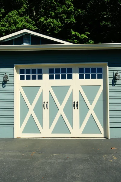 Garage door with white trim — Stock Photo, Image
