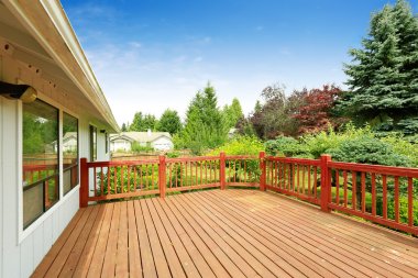 Spacious walkout deck with railings  clipart
