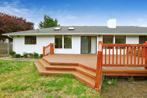 Spacious walkout deck with railings and stairs — Stock Photo, Image