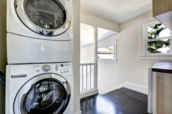 Laundry area with modern white appliances — Stock Photo, Image