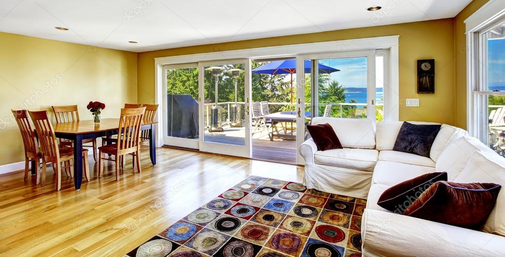 Living room with walkout deck and bay view. Tacoma real estate, 