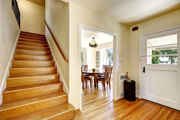 Entance hallway with wooden staircase