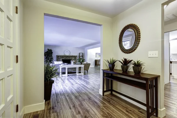 Entrance hallway with table and mirror