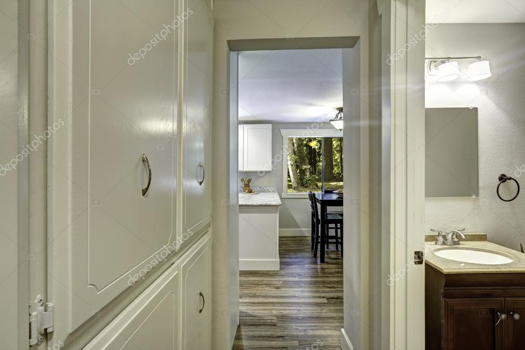 Small walkthrough with builtin and exit to bathroom — Stock