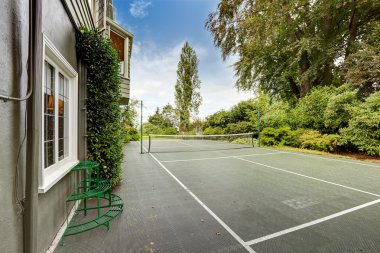 House with tennis court. Tacoma real estate clipart