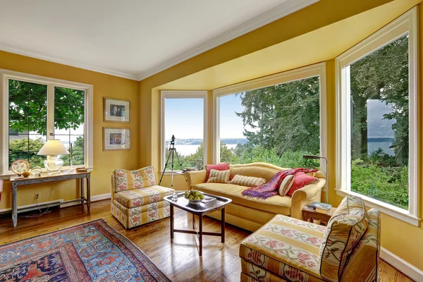 Yellow sitting area  with large window — Stock Photo, Image