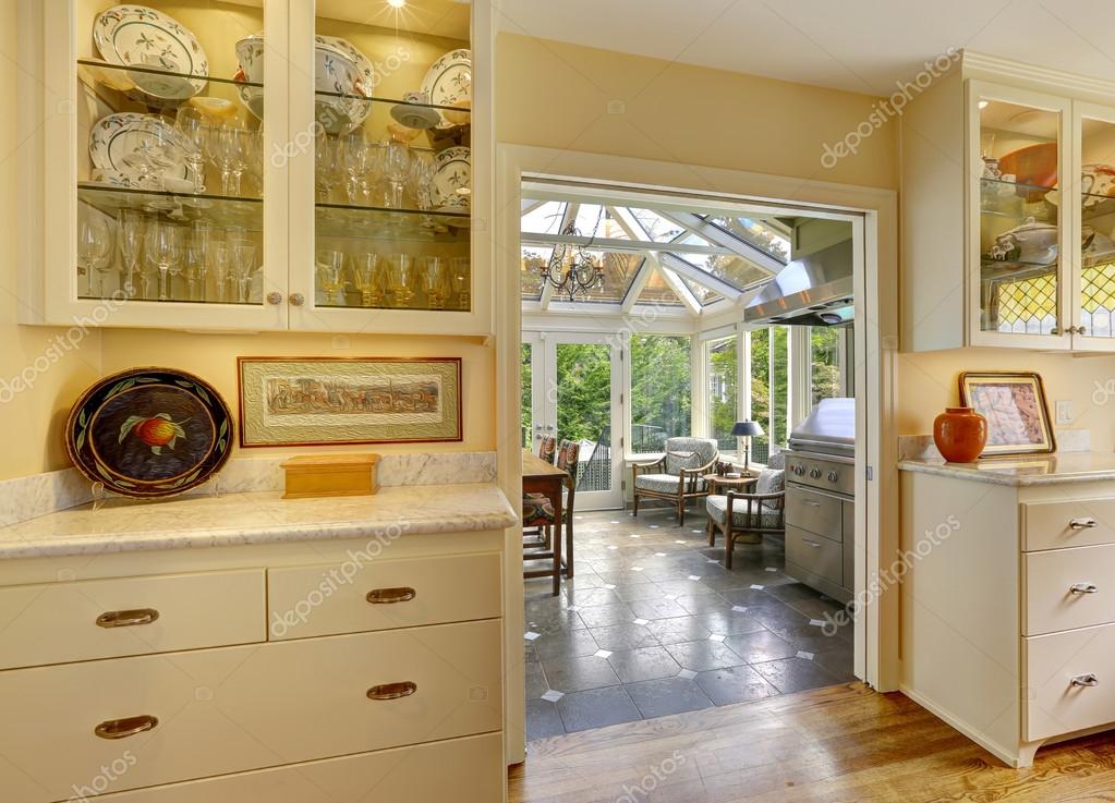Kitchen Room With Exit To Patio Area In Sunroom Stock