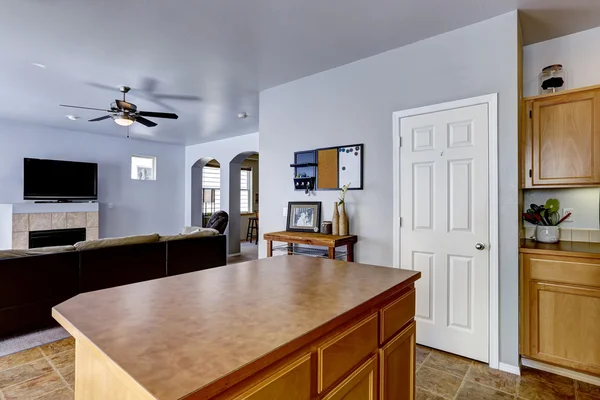 Kitchen island with brown counter top — Stock Photo, Image