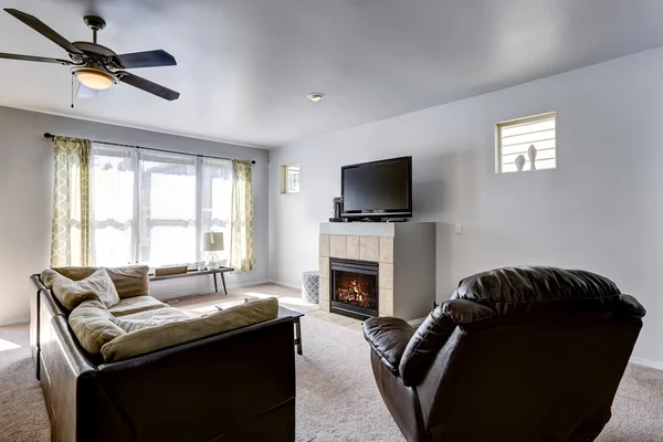 Family room with fireplace and TV — Stock Photo, Image