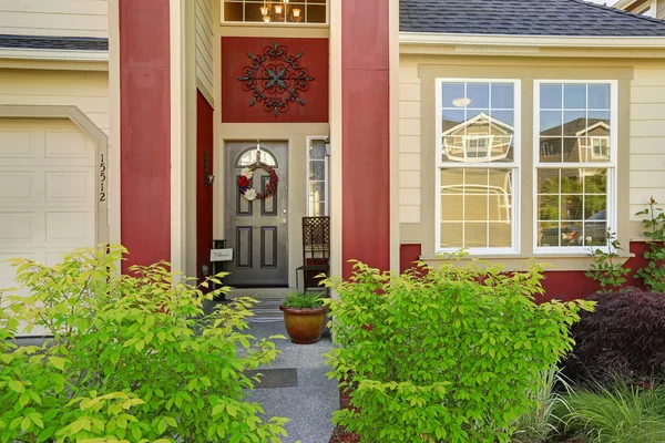 Entrance porch with red trim — Stock Photo, Image