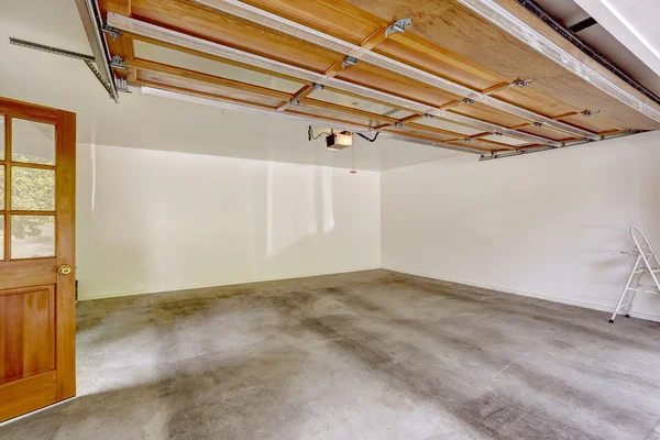 Garage interior with open automatic door — Stock Photo, Image