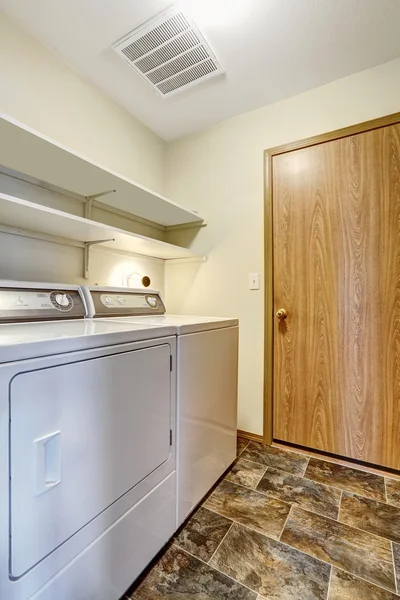 Room with laundry appliances — Stock Photo, Image