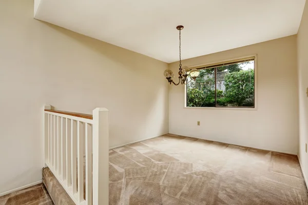 Empty room in soft ivory tones with railing — Stock Photo, Image