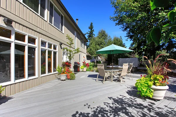 House with patio area on backyard — Stock Photo, Image