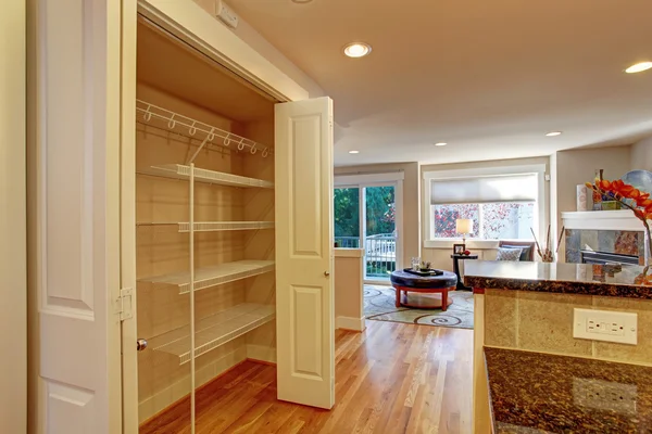 Kitchen room with storage rack — Stock Photo, Image