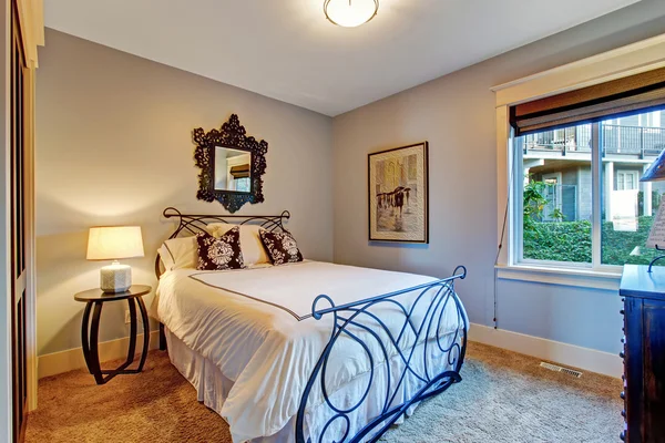 Bedroom with iron frame bed — Stock Photo, Image