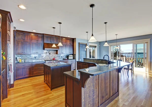 Luxury kitchen with dark brown storage combination Stock Picture