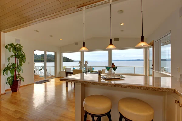 Luxury house interior. Bar counter top with stools and dining ar — Stock Photo, Image