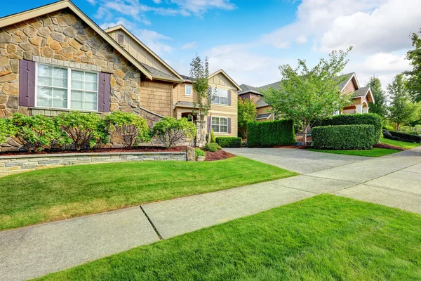 Luxury house exterior with stone trim — Stock Photo, Image