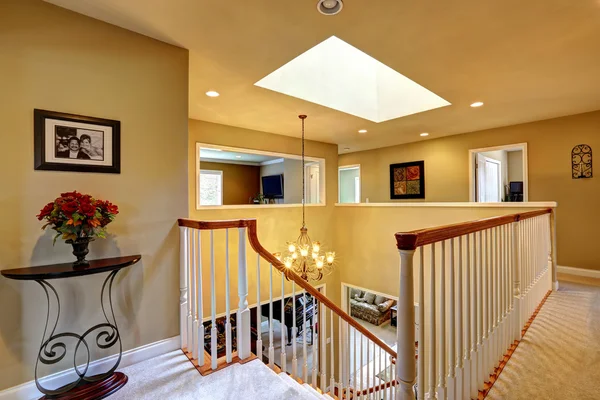 Luxury house interior. Upstairs hallway with staircase — Stock Photo, Image