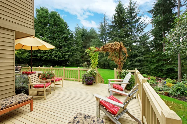 Spacious walkout deck with patio area and chairs — Stock Photo, Image