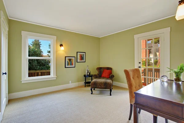 Office room with leopard chair in the corner — Stock Photo, Image