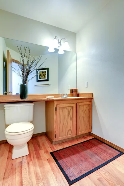 Bathroom vanity cabinet with counter top and mirror — Stock Photo, Image