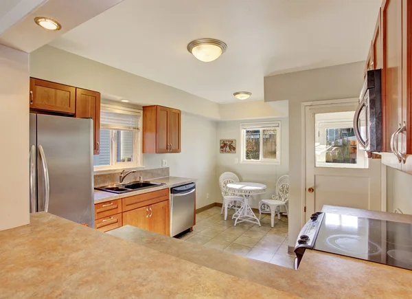 Modern kitchen with tile floor. — Stock Photo, Image