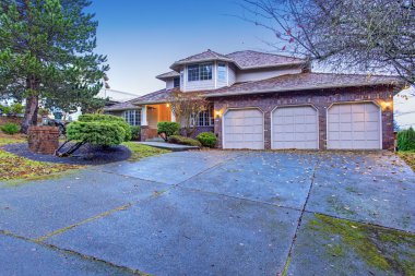 Traditional brick house with garage.
