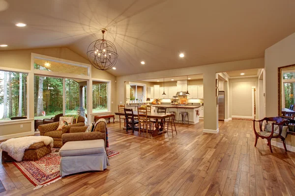 Well lit dinning room with connected living room. — Stock Photo, Image