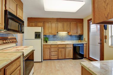 simple bathroom with tile floor and window.