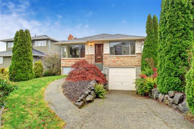 simple bathroom with tile floor and window.