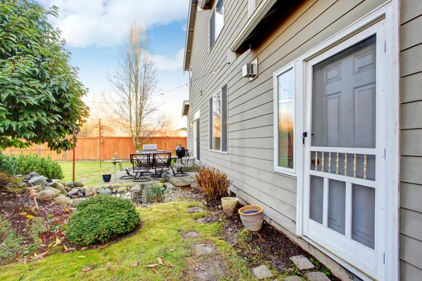 Large backyard with patio. — Stock Photo, Image