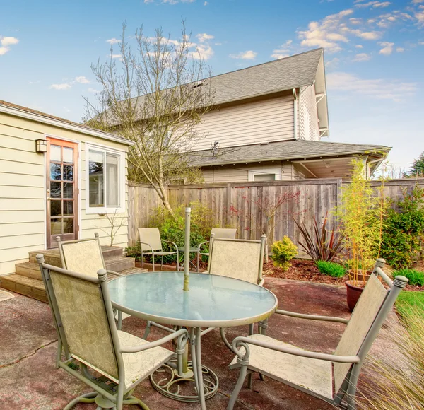 Authentic back yard with patio and greenery. — Stock Photo, Image