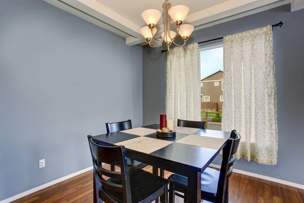 Simplistic dinning room with gray walls. — Stock Photo, Image