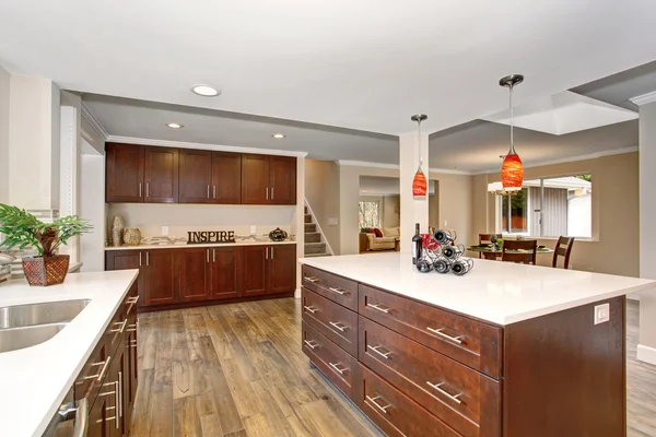 Large kitchen with white counter tops. — Stock Photo, Image