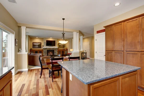 Classic kitchen with island and stainless steel fridge. — Stock Photo, Image