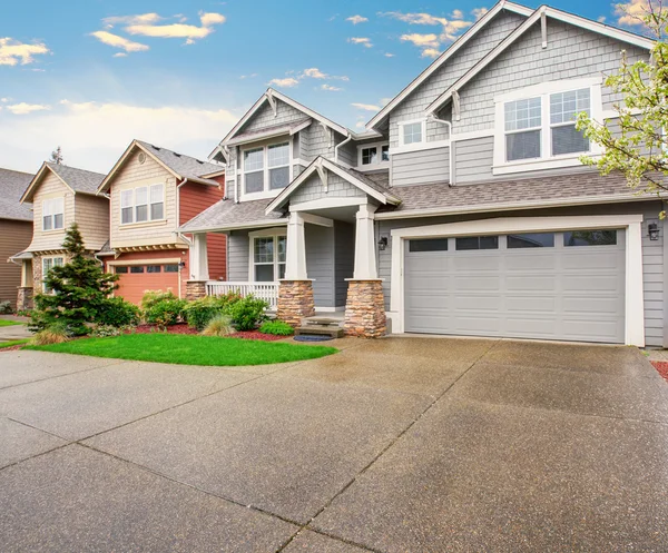 Large modern home with gray exterior. — Stock Photo, Image