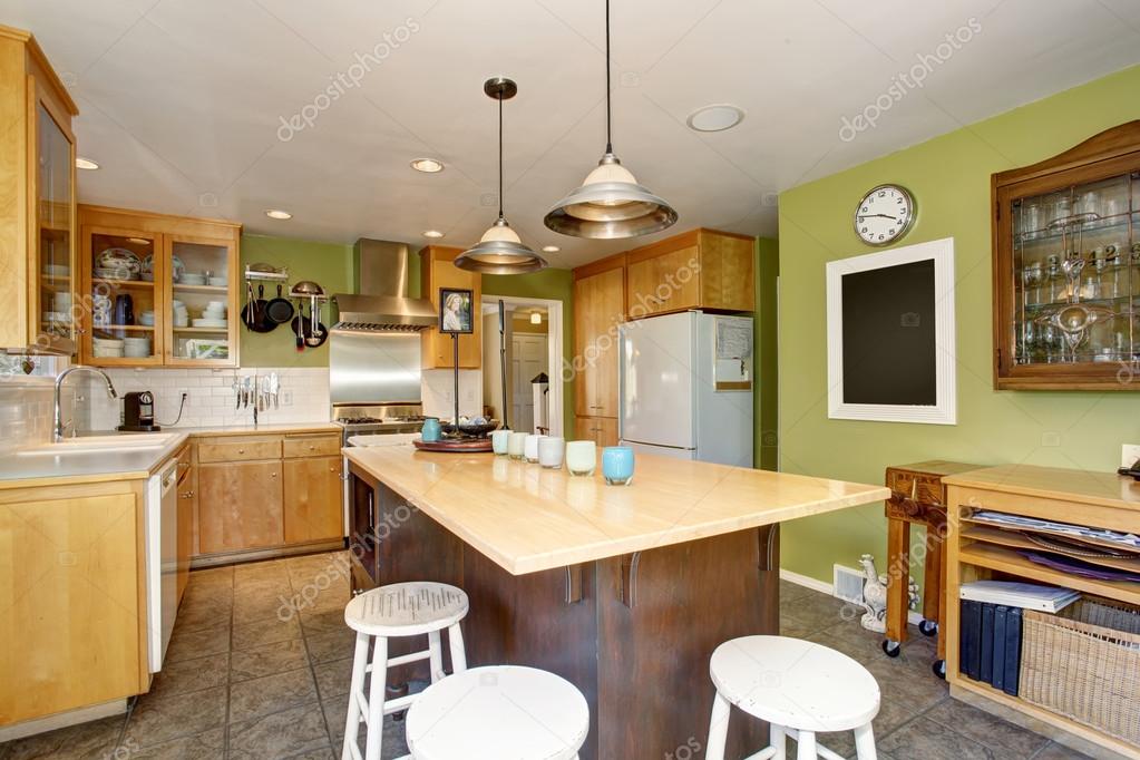 Unique Kitchen With Green Walls And Island Stock Photo