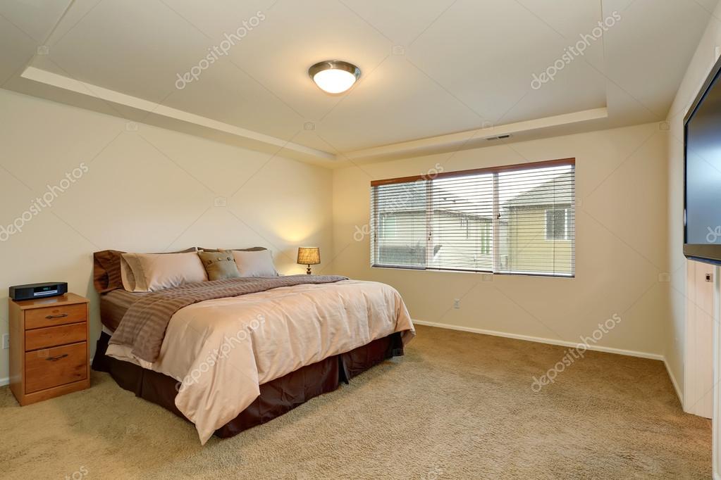 Nice Master Bedroom With Simple Decor Stock Photo