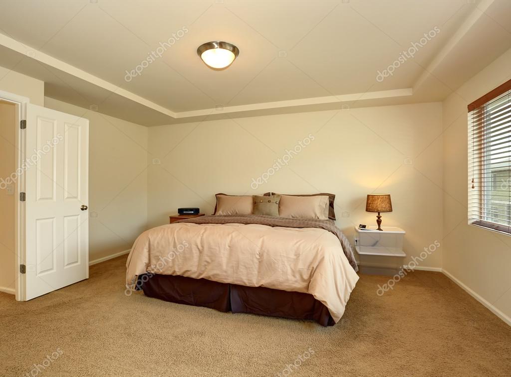 Nice Master Bedroom With Simple Decor Stock Photo