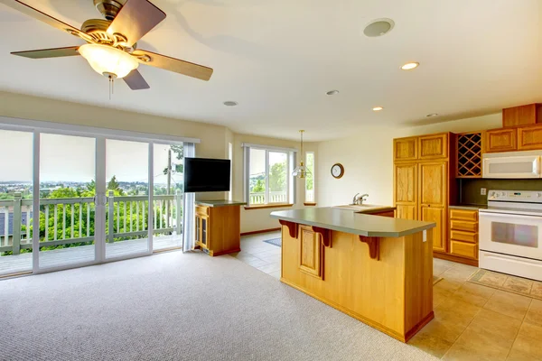 Simple kitchen with gray counter tops. — Stock Photo, Image