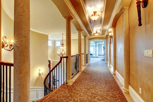 Elegant hallway with black railing. — Stock Photo, Image