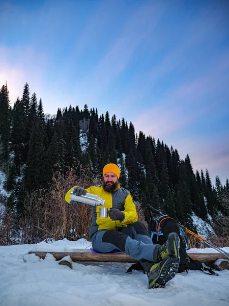 Bearded Traveler Mountains Winter Rests Pours Hot Drink Thermos Extreme — Stock Photo, Image