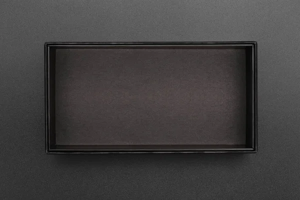 Вид Сверху Пустой Черный Ящик Черной Поверхности — стоковое фото