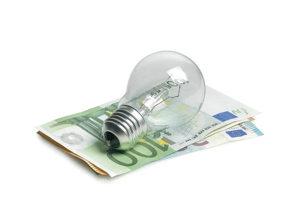 Bombilla Luz Sobre Billetes Euros Aislados Concepto Coste Energético —  Fotos de Stock